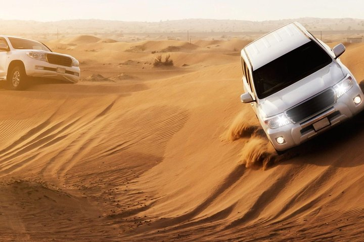 Experience the thrill of dune bashing through endless sands where every twist and turn reveals the stunning beauty of the Dubai desert landscape creating memories that last a lifetime.